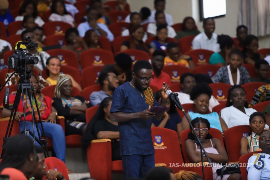 A participant asking a question during the open discussion