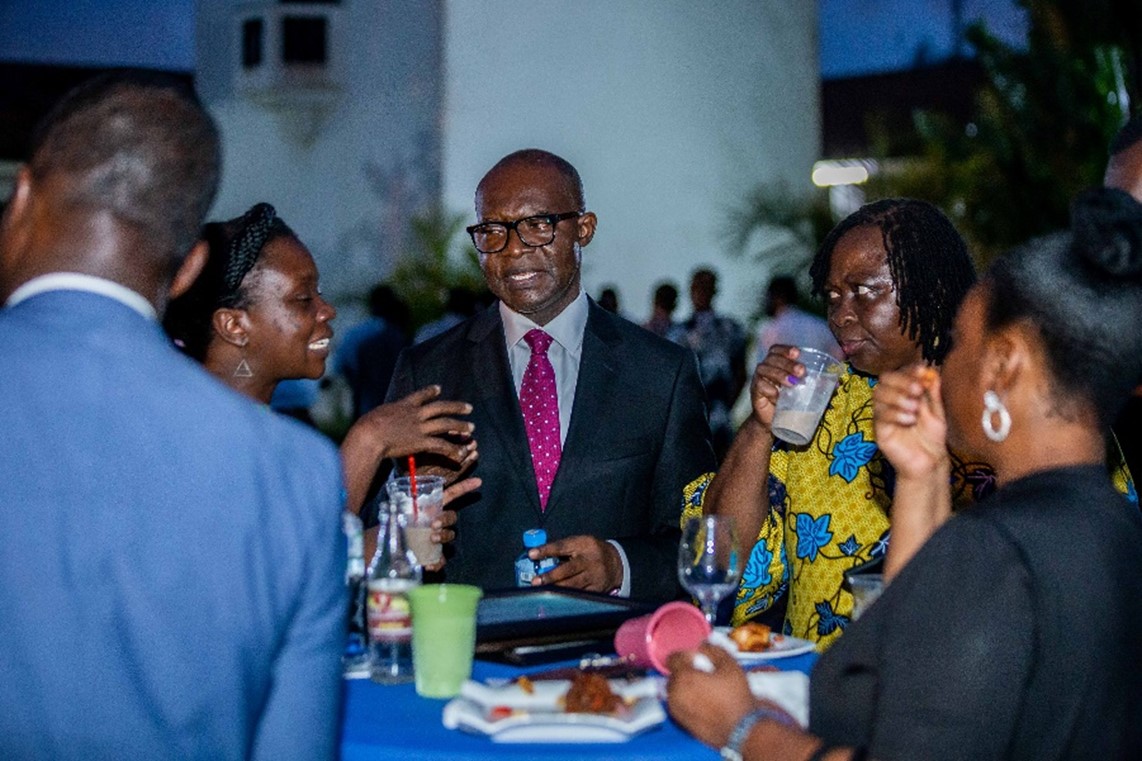 Professor Daniel Frimpong Ofori, Provost, College of Humanities interacting with some attendees at the cocktail reception.